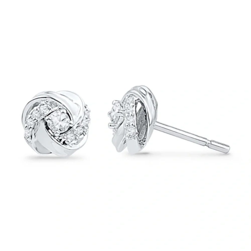 1/8 CT. T.W. Diamond Love Knot Stud Earrings in 20K White Gold - Picture 1 of 5